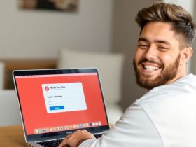 Excited designer celebrating first freelance web design job payment online.